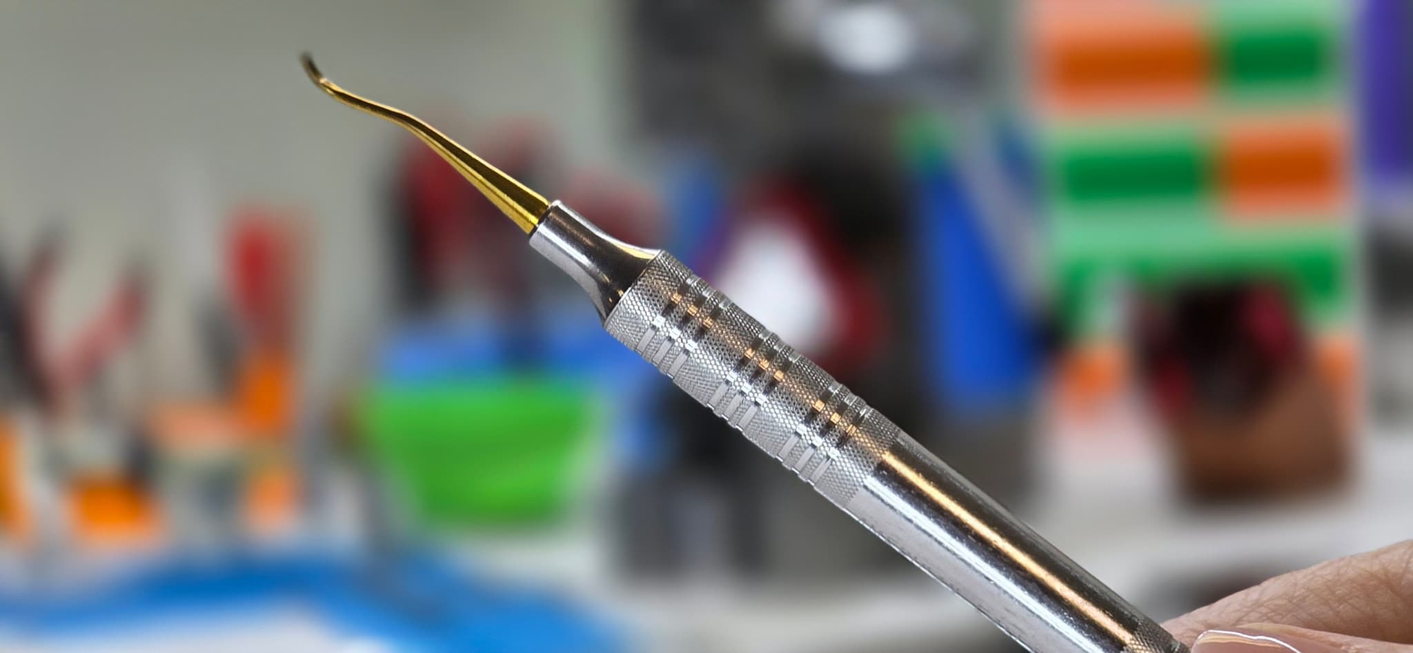 Sharpening and retipping dental instruments